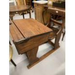 19th cent. Pitch pine school desk with elm seat ink well holder.