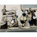 20th cent. Ceramics: Cama Spanish porcelain figures carrying wine bottles, dressed in brown with