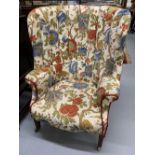 Early 19th cent. Georgian wing back armchair. Re-upholstered in floral design. Tapered supports with