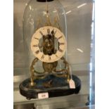 Clocks: 19th cent. Brass Gothic arch skeleton clock. Fusee movement chiming on the hour, white