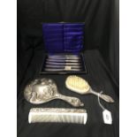 Platedware: Dressing table set of hand mirror, brush and comb. Plus a boxed set of butter knives.
