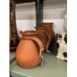 19th/20th cent. Wedgwood terracotta graduated jugs (3). Glazed internally, impressed marks on
