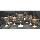 The Thomas E Skidmore Collection: Chinese export silver small trophies, two handled "Good Wishes"