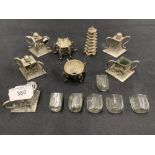 The Thomas E Skidmore Collection: Chinese export silver condiments, diamond shaped with applied
