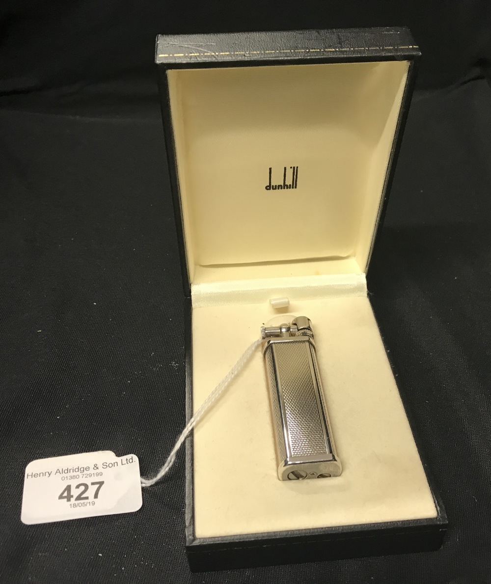 Smoking Requisites: Dunhill Sylphide gas lighter, white metal, boxed. An I.P.M. flip top lighter.