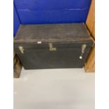 Travel car trunk. Possibly Rolls Royce, Dunhill label above lock. Blackened leather, three locks.