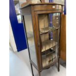 Edwardian mahogany and inlaid bow fronted display cabinet. Lead glazed coloured glass inserts,