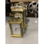 Clocks: Carriage clocks. Bayard mechanical clock, white faced with Roman numerals, and a battery