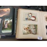 Postcards: Early 20th cent. in two albums containing more than 230 cards. Selection of real photo