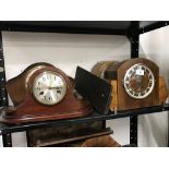 Clocks: Mantle clocks. Two Smiths clocks one Napoleon hat shaped and one art deco form, foreign make