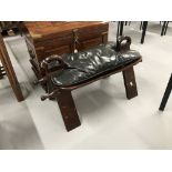 20th cent. Asian hardwood and leather camel saddle stool with brass inlay.