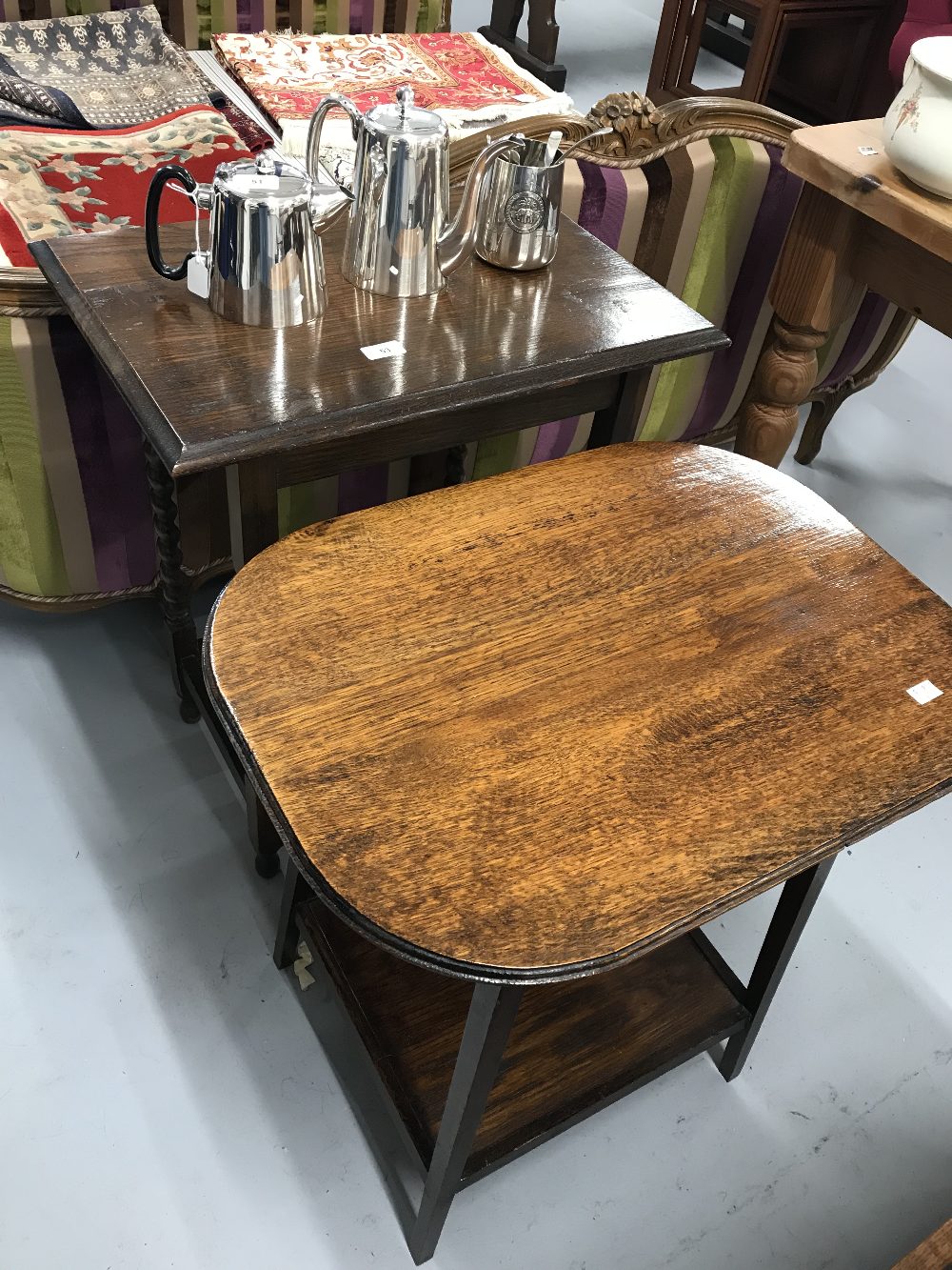 20th cent. Two oak side tables. Oblong 23ins. x 16ins. x 29ins. Oval 24ins. x 17ins. x 26ins.