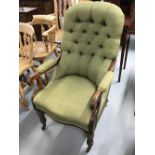 19th cent. Mahogany upholstered library chair with padded elbow rests. (1 arm a/f.)