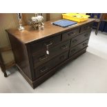 20th cent. Veneered three over four chest of drawers with brass handles. 60ins. x 20ins. x 30ins.