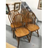 20th cent. Teak dining chairs, stick backs x 4.