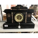 Clocks: 19th cent. Victorian mantel clock in the new classical style. Black marble with coloured