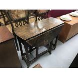 18th cent. Oak gate leg table, bobbin turned supports and stretchers, peg jointed. 33ins. x 27½