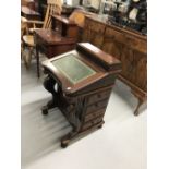 Mahogany reproduction davenport with eight side drawers. 22ins. x 22ins. x 34ins.