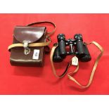 Binoculars: Carl Zeiss 8 x 30, No 5181797, black with brown leather carrying case.