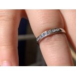 Jewellery: Platinum 950 diamond half eternity/wedding ring. 7 x 0.04ct round brilliant cut