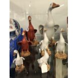The Thomas E Skidmore Collection: Early 20th cent. Ceramic geese, red oxide and blanc d chime of
