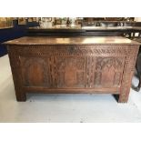 18th cent. Style oak coffer with carved and inlaid decoration. 51ins.