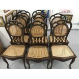 20th cent. Chinese hardwood and rattan dining chairs x 8.