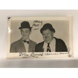 Autographs: Hand signed Stan Laurel and Oliver Hardy photo postcard, Stan is in black ink and Oliver