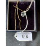 Aquamarine jewellery. Oval cut pendant on rope twist chain marked 375, and tested 9ct. 3.9gms