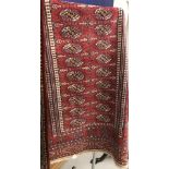 20th cent. Rug: 20th cent. Small Bokhara, red ground with 26 gils, one border & six guard borders