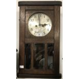 Clocks: 19th cent. Oak cased wall clock with 'silvered' face.