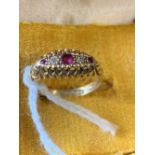 Hallmarked Gold Jewellery: Ring set with diamonds and rubies. 18ct. 3gms inclusive.