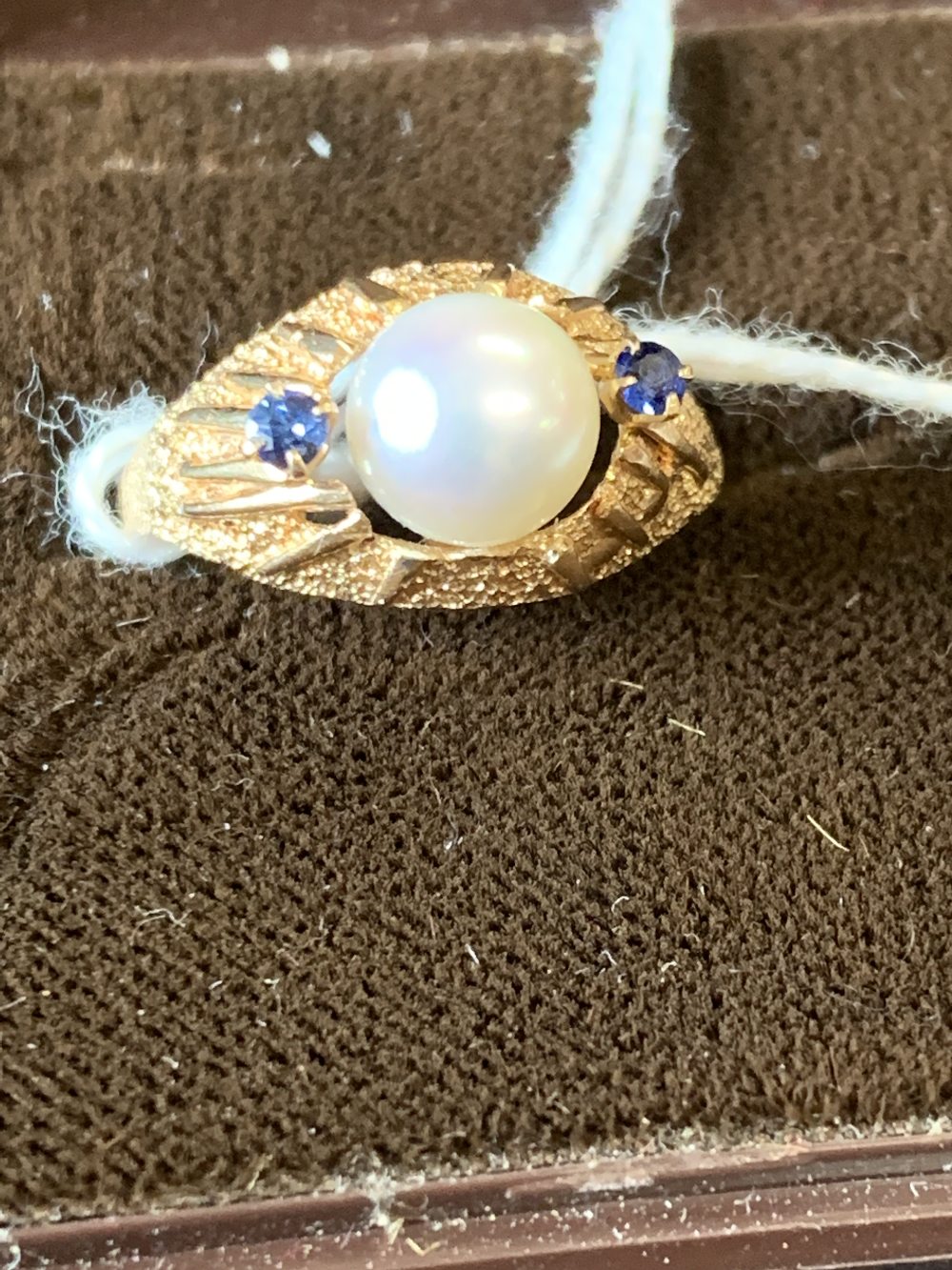 Gold Jewellery: 14ct. yellow gold (tested) pearl and small sapphire ring. 3.2gms.