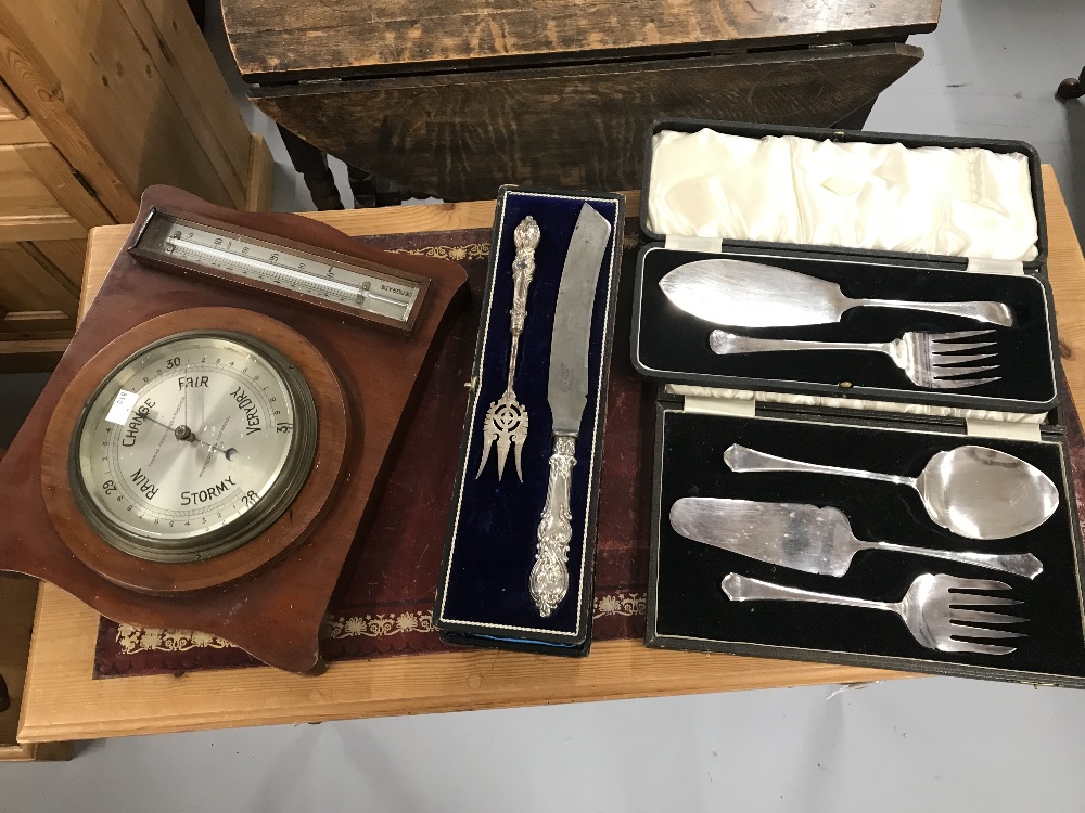 Thomas Armstrong & Brother mahogany barometer and three boxed pairs of fish knives and servers (1