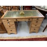 20th cent. Veneered desk with one drawer over knee hole, six side drawers and leather inlaid top.