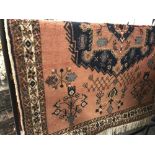 20th cent. Carpet: Red/blue patterned 83ins. x 65ins.