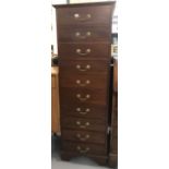 20th cent. Hardwood chest of ten drawers with brass handles.