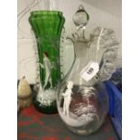 Glassware: 19th cent. Green glass vase with a dandy carrying a cane, a wine decanter with a child