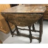 18th cent. Oak gate leg table, bobbin turned supports and stretchers, peg jointed. 33ins. x 27½