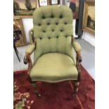 19th cent. Mahogany upholstered library chair with padded elbow rests. (1 arm a/f.)