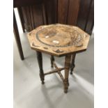 Arts and Crafts/Art Nouveau: Circular side table with pen/poker work style decoration of a young