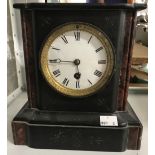 Clock: Slate and marble mantle clock. Enamel face with Roman numerals, unmarked movement. 9ins. x