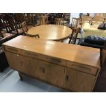 1970s Teak G-Plan dining suite comprising: sideboard, extending dining table and six dining