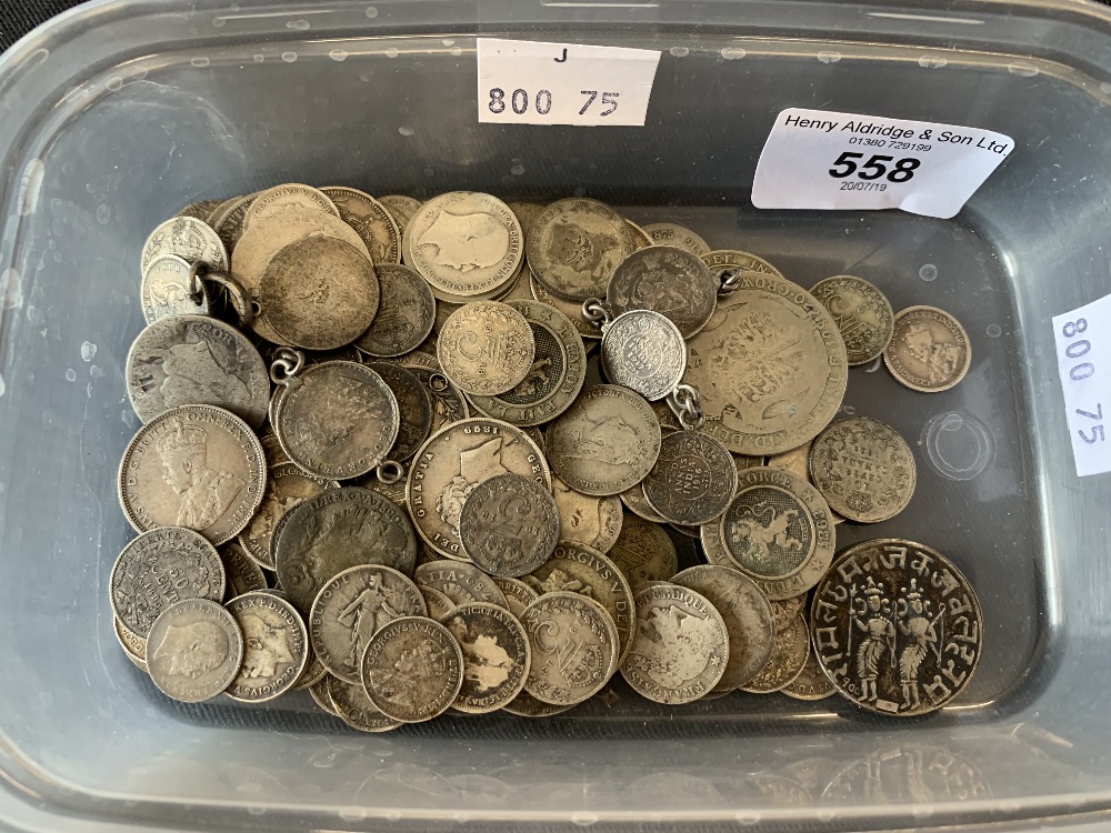 Coins: Full silver half crown, shillings, threepenny bits, some foreign. 9½oz.