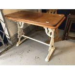 Gardenalia: 20th cent. Outdoor table with oak top on cast iron supports. 40ins. x 20ins. x 30ins.