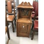 Edwardian mahogany coal box with embroidered panel and carved Art Nouveau decoration.