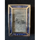 Iconic Memorabilia/Royal's: A silver mounted blue hardstone photograph frame containing a snapshot