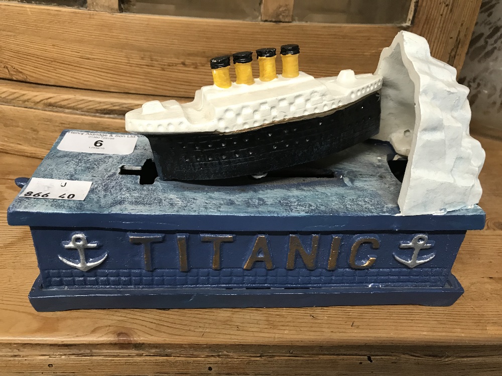 Toys: Reproduction cast iron Titanic money box. (A/F)