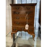 20th cent. Dolls furniture, mahogany Horace Uphill Queen Anne style chest on stand. Three long and 2