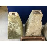 Stonework: Limestone saddle stone bases, standing at 27ins and 28ins. A pair.